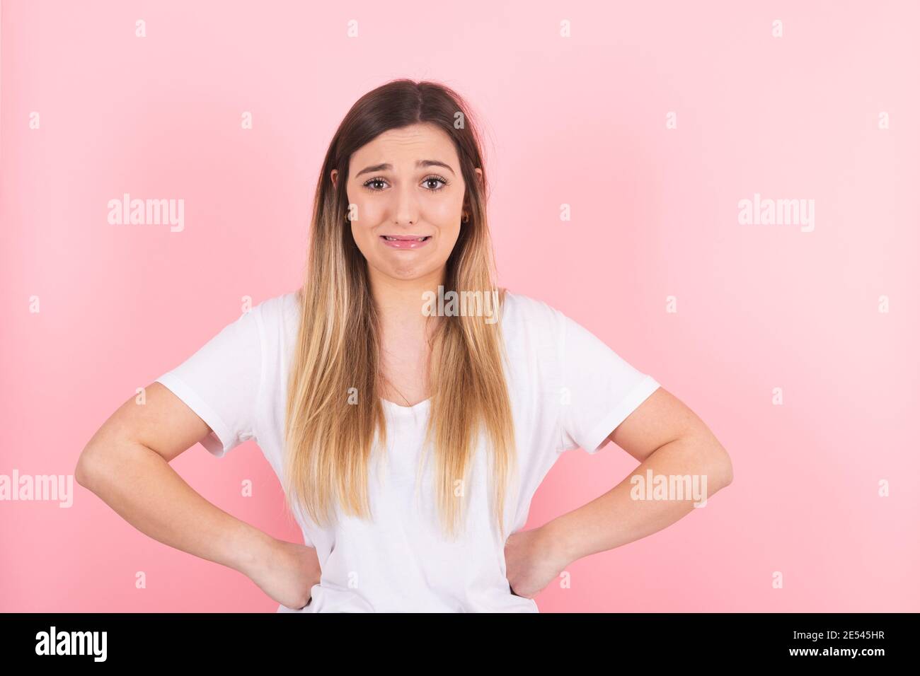 young woman with a gesture of disgust and despair Stock Photo