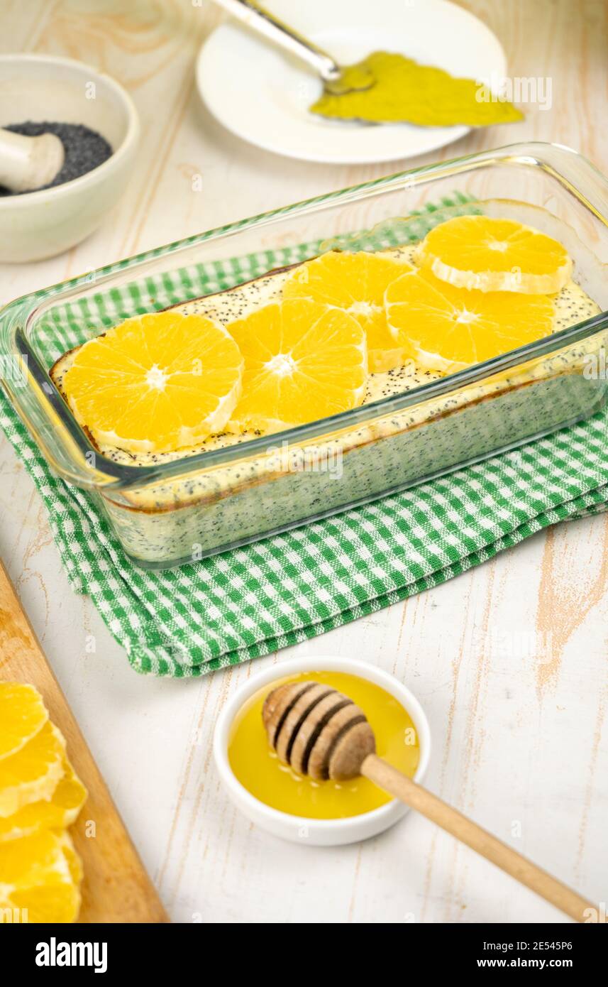 Healthy dessert. Cheesecake with poppy seeds and oranges Stock Photo