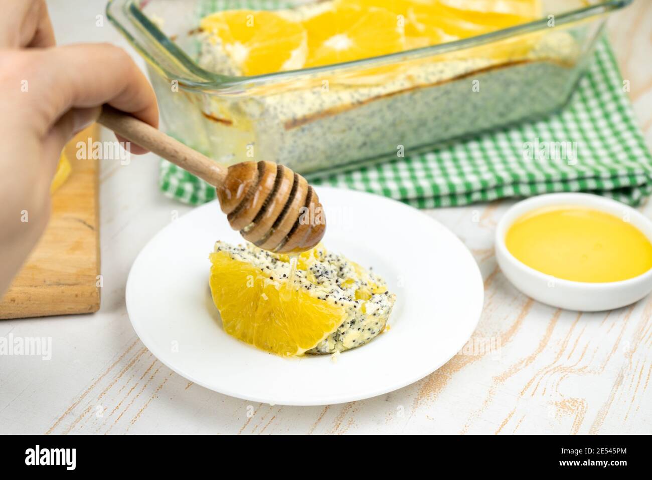 Healthy dessert. Cheesecake with poppy seeds and oranges Stock Photo