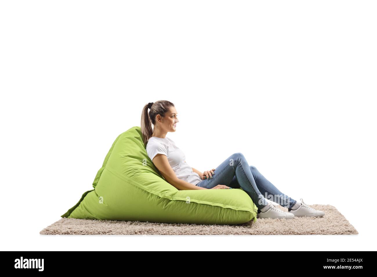 Casual young woman sitting on hi-res stock photography and images - Alamy