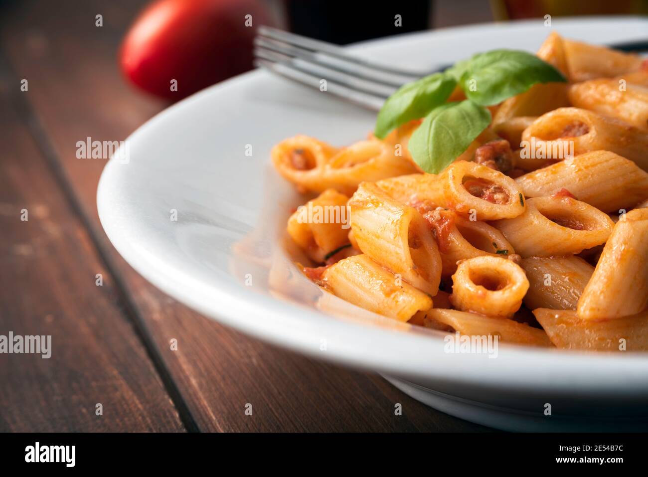 Dish of mezze penne pasta with bolognese sauce, Italian cuisine Stock Photo