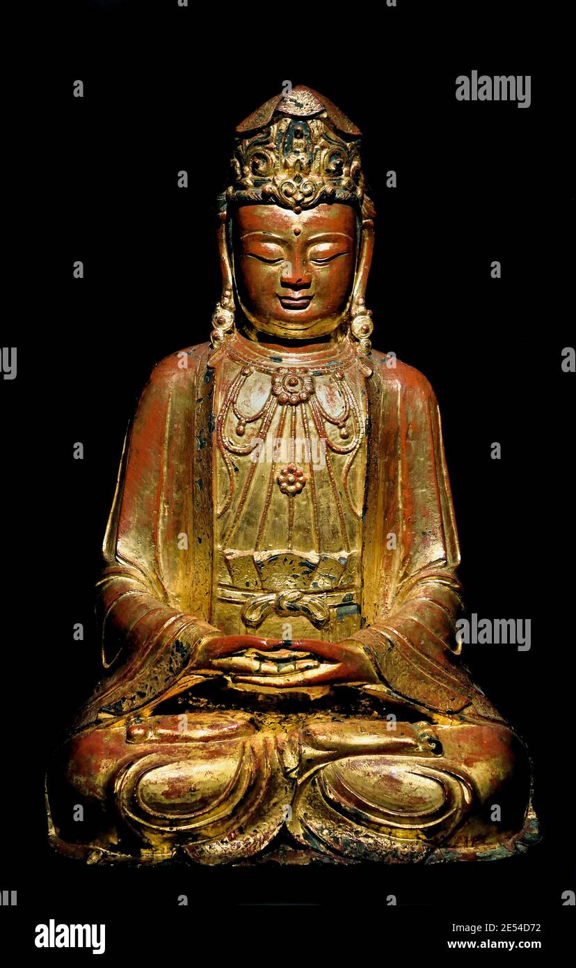 Bodhisattva Guanyin, Mid-15th c. Seated, CHINA The Ming dynasty family of emperors who led China 1368 to 1644 AD , ( Ming Empire 276 )  Years) Stock Photo