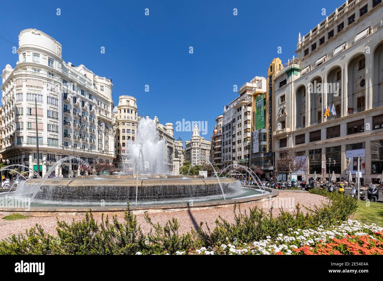 Facades Of Townhouses In Valencia With A Fountain In The Foreground, Spain, Europe Stock Photo