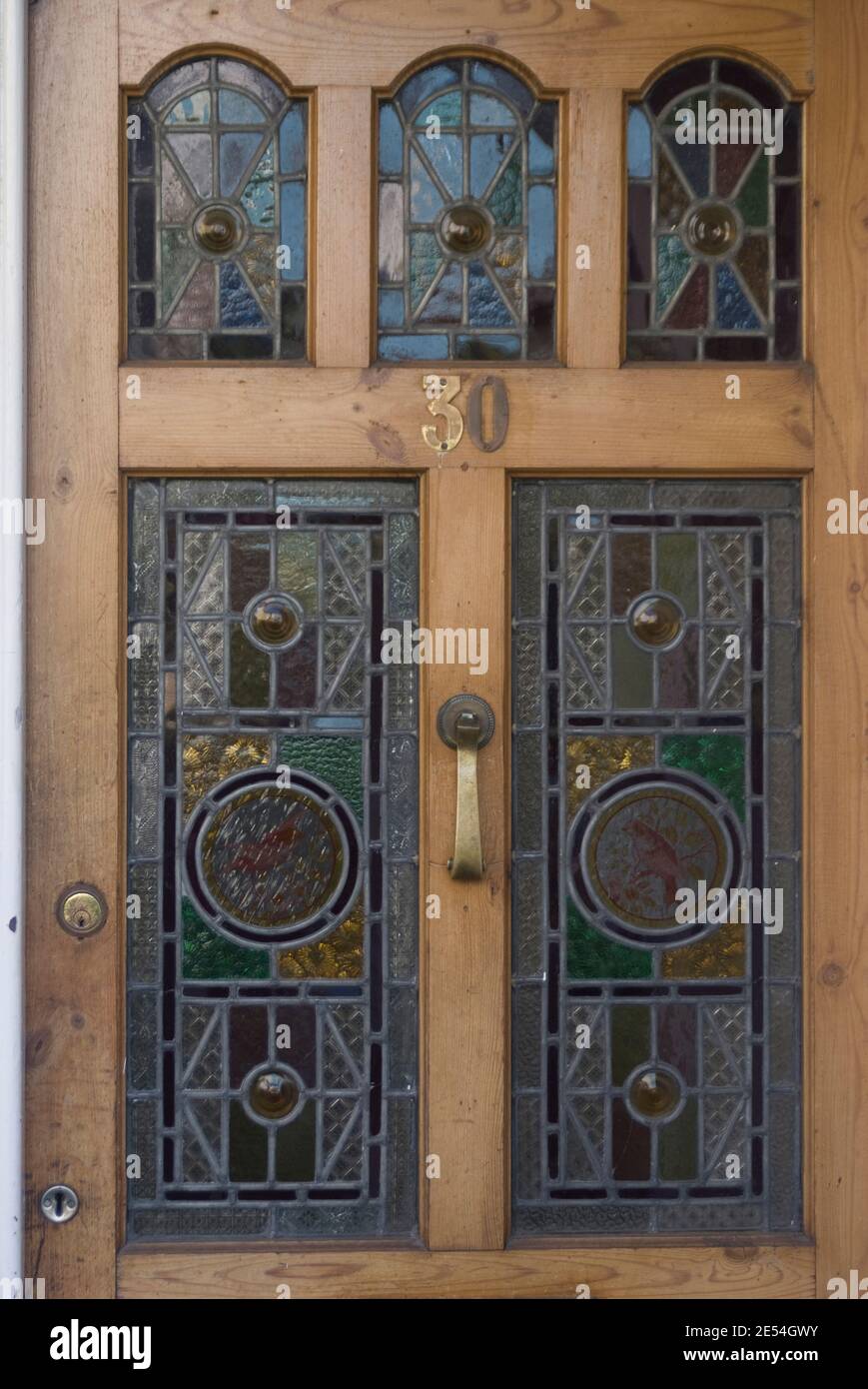 Stained glass inlays on a front door of a domestic house, Peckham, London, SE15, England | NONE | Stock Photo