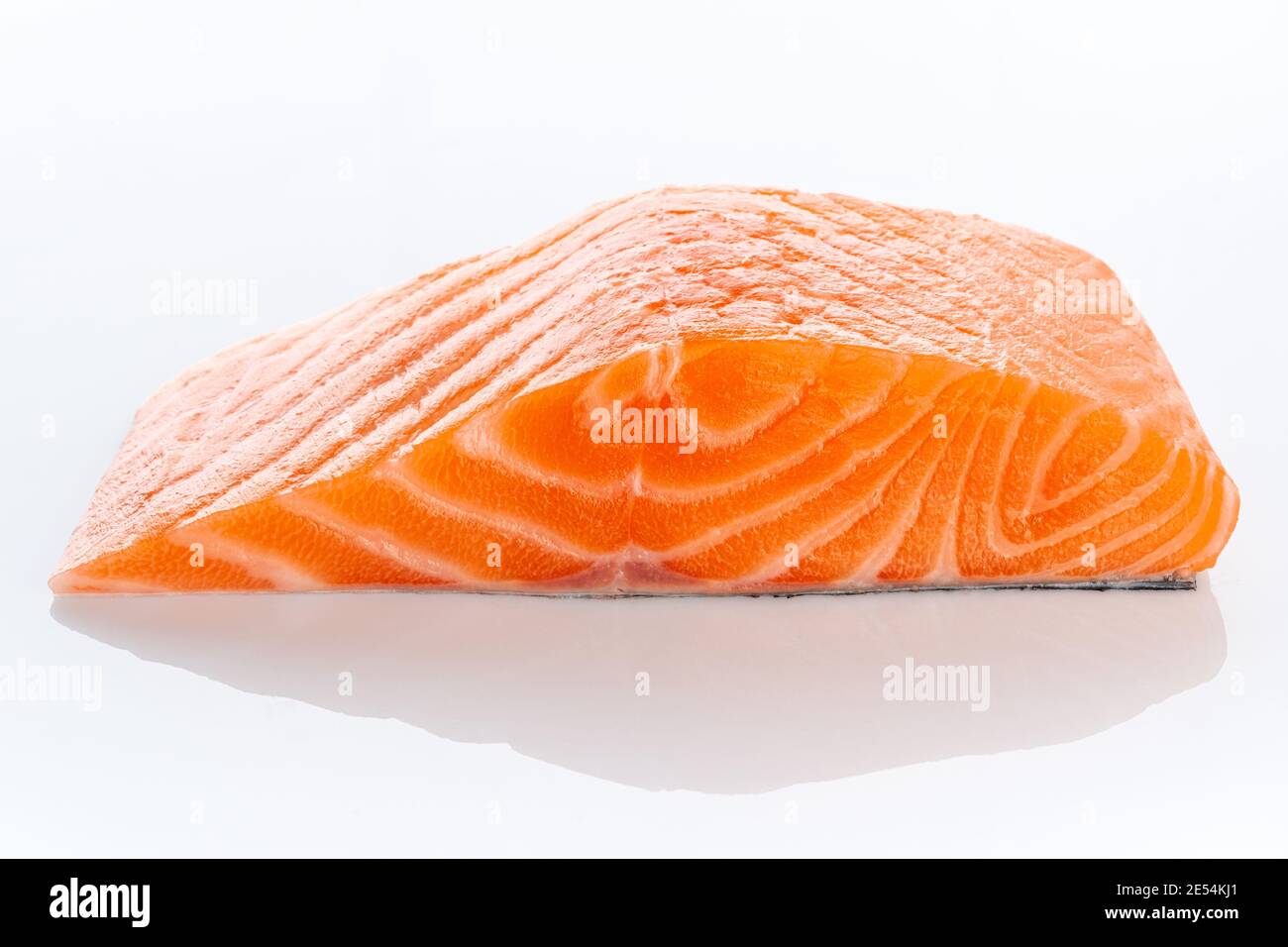 Fresh raw uncooked salmon fillet slice steak isolated on white