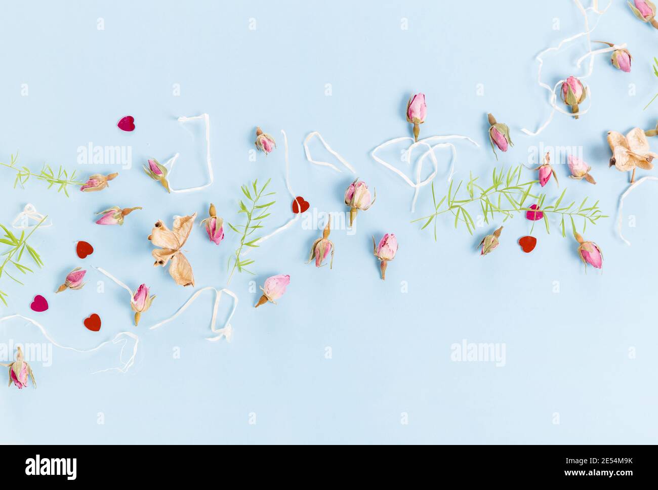 Flowers composition. Frame made of dried rose flowers on blue ...
