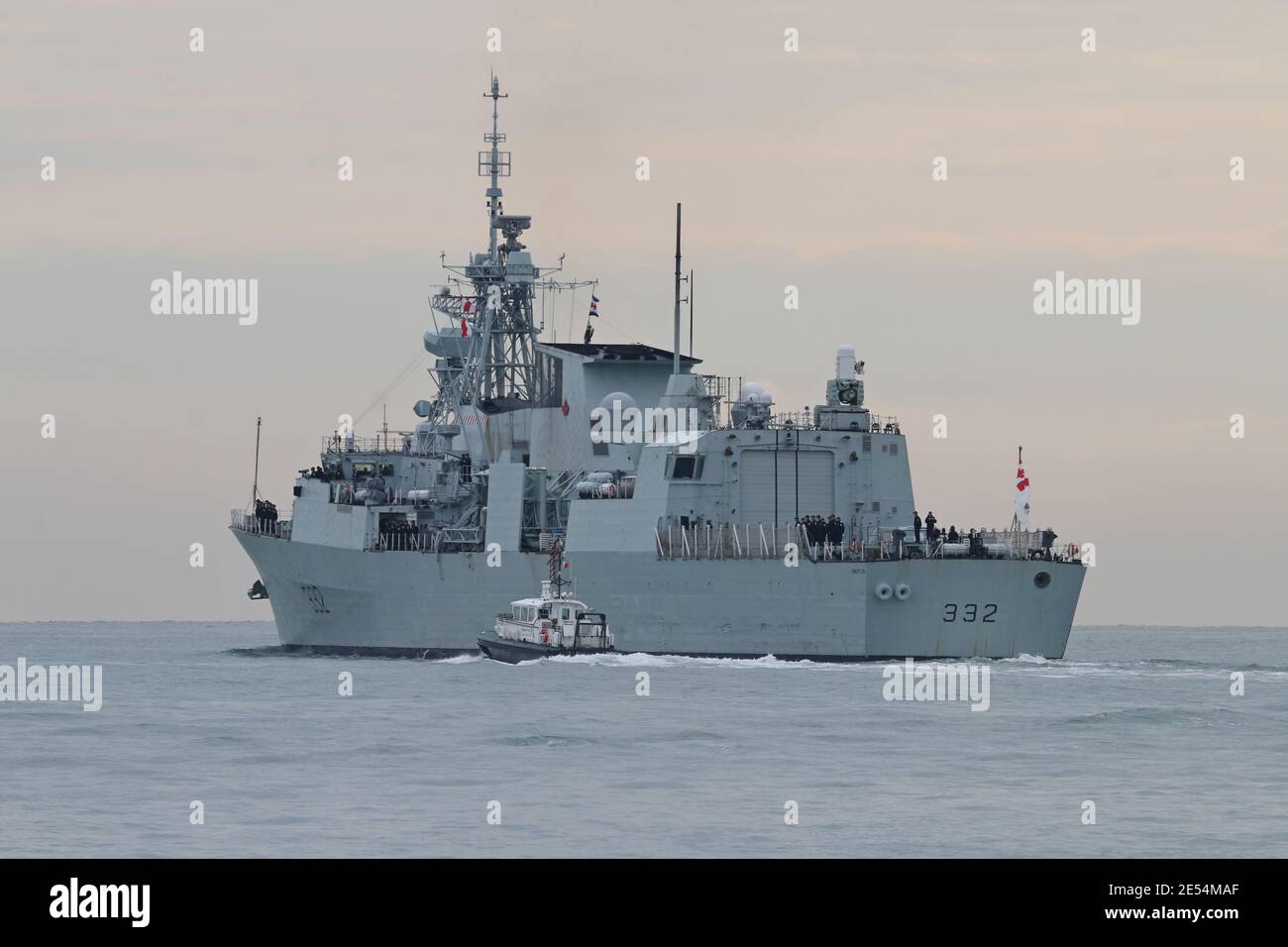 Escorted by an Admiralty pilot vessel the Royal Canadian Navy ship HMCS