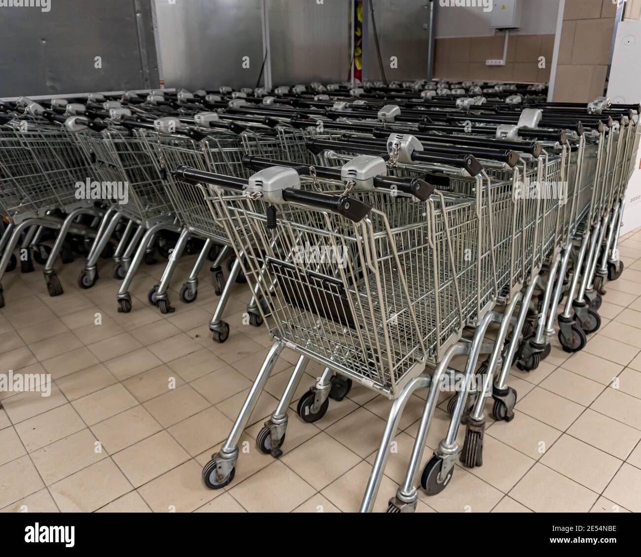 Lots of shopping carts in the supermarket Stock Photo Alamy