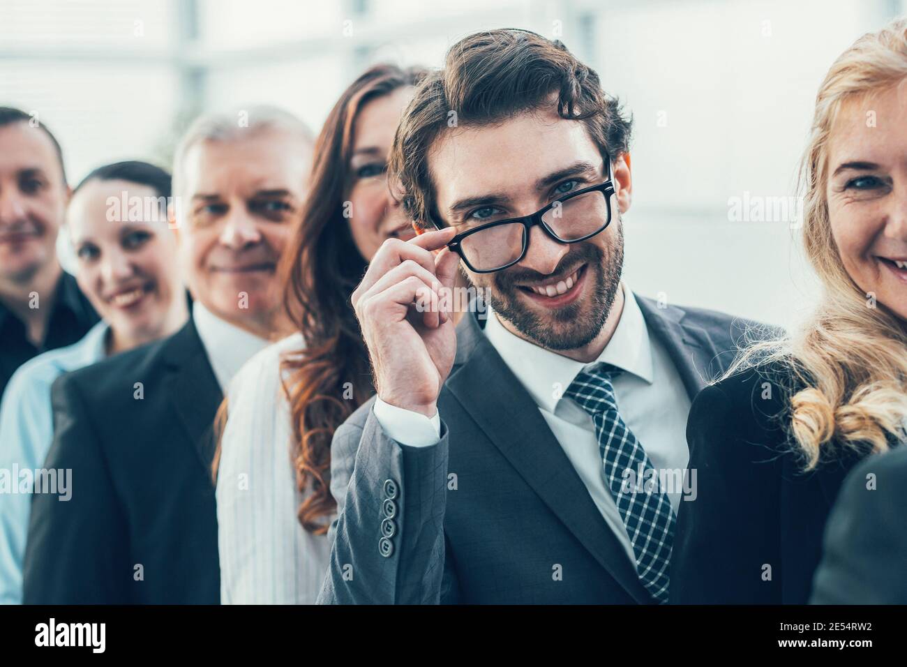 group of successful business people standing in a row Stock Photo - Alamy