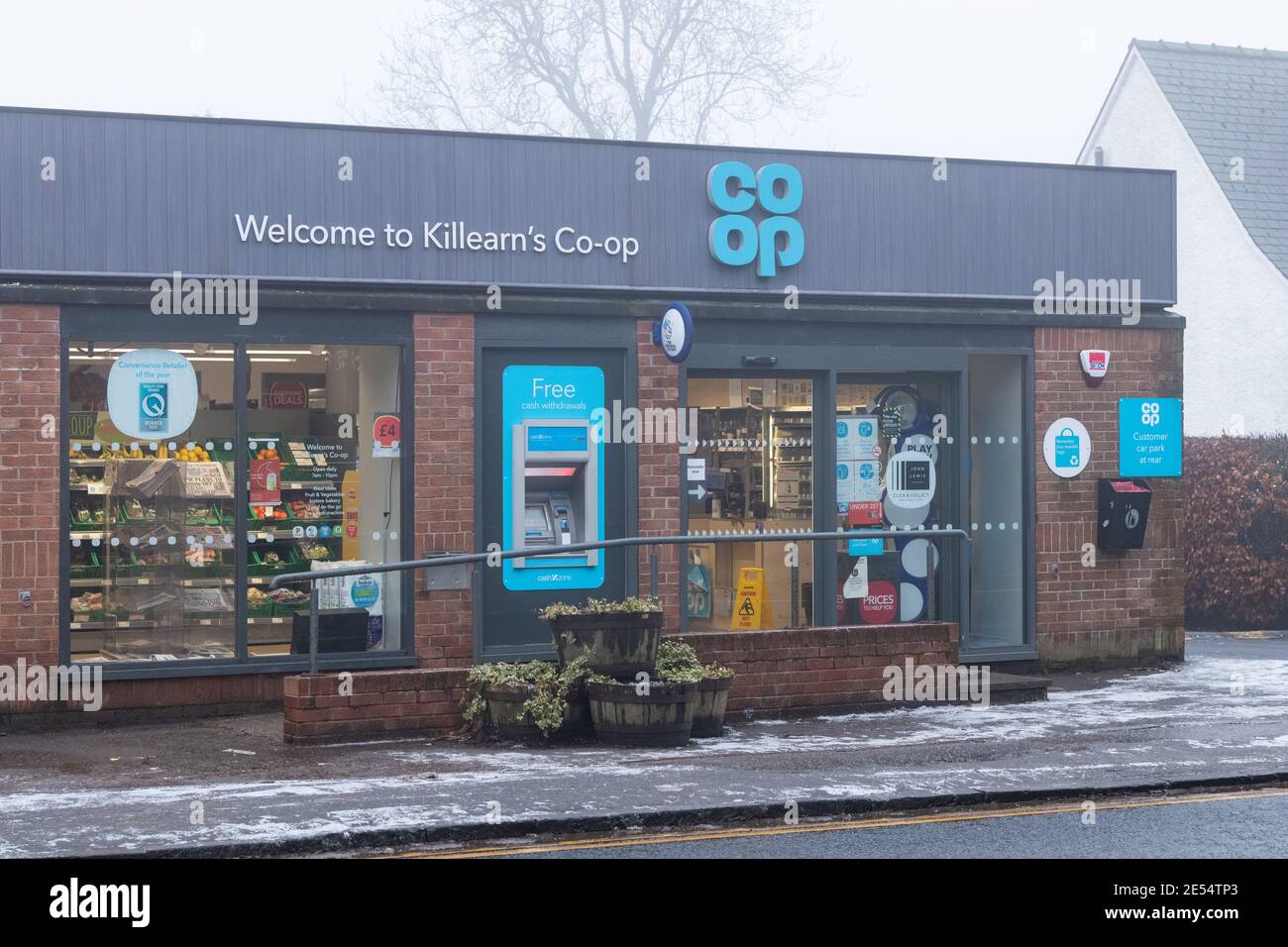 coop shop store in village with cash dispenser and wheelchair access ramp - Killearn, Stirling, Scotland, UK Stock Photo