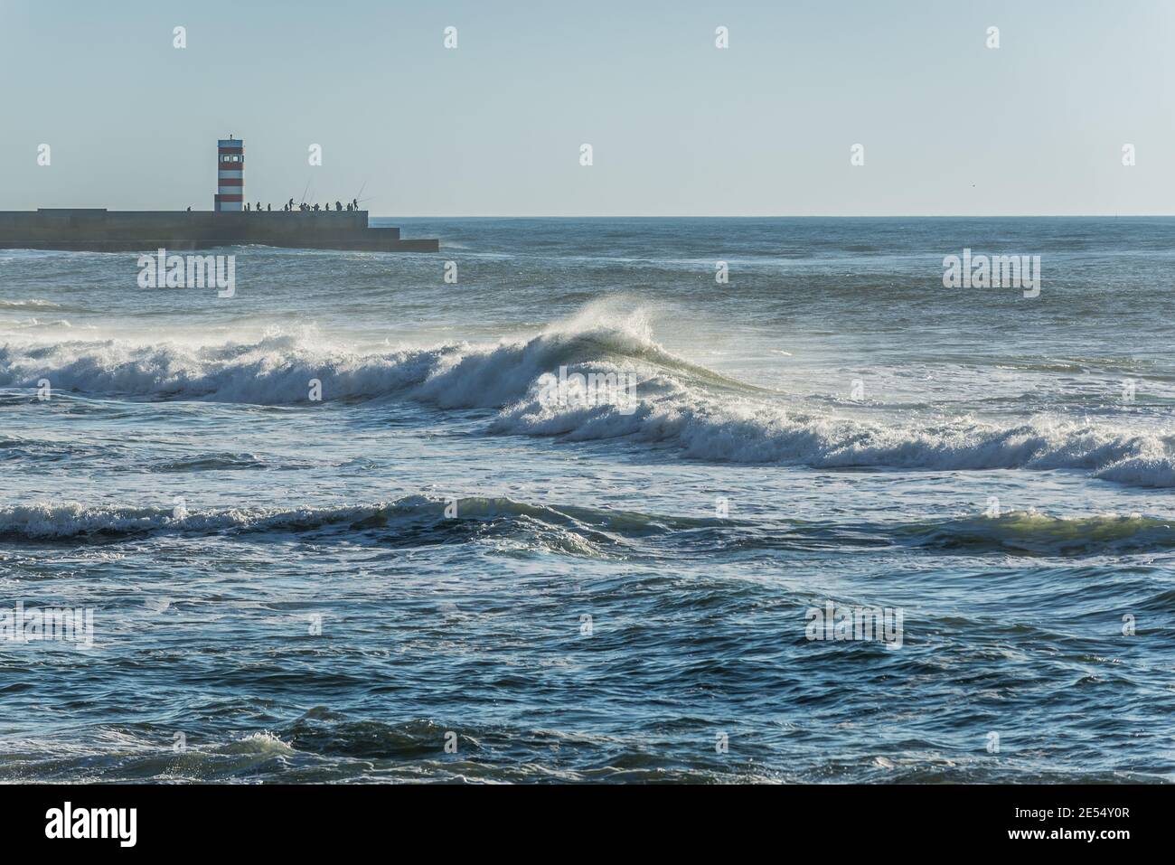 Breakwater with small lighthouse (Farolins da Barra do Douro) in Foz do Douro district of Porto city, second largest city in Portugal Stock Photo