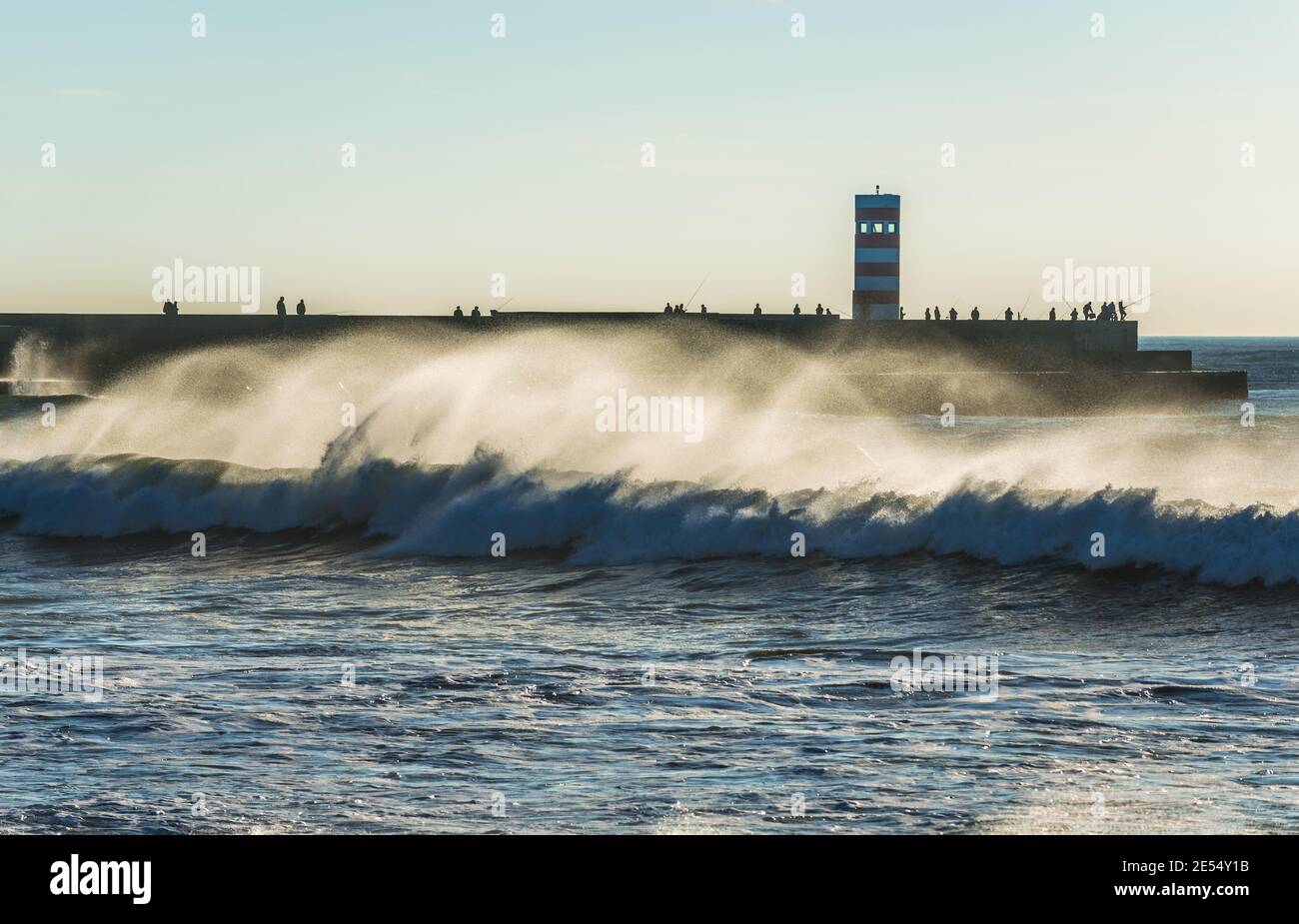 Breakwater with small lighthouse (Farolins da Barra do Douro) in Foz do Douro district of Porto city, second largest city in Portugal Stock Photo