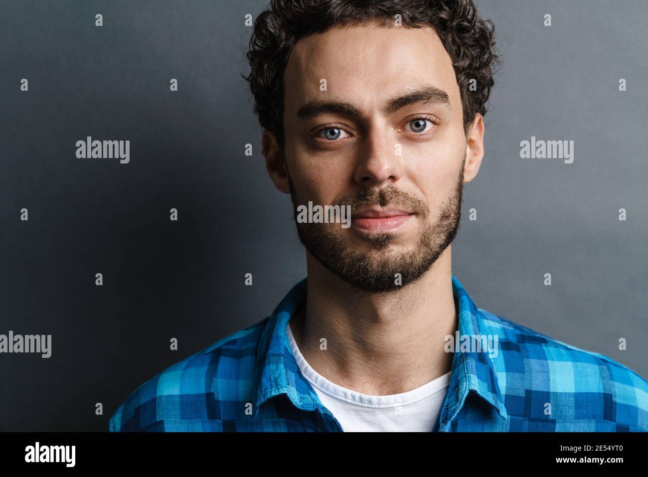 Unshaven handsome guy posing hi-res stock photography and images - Alamy