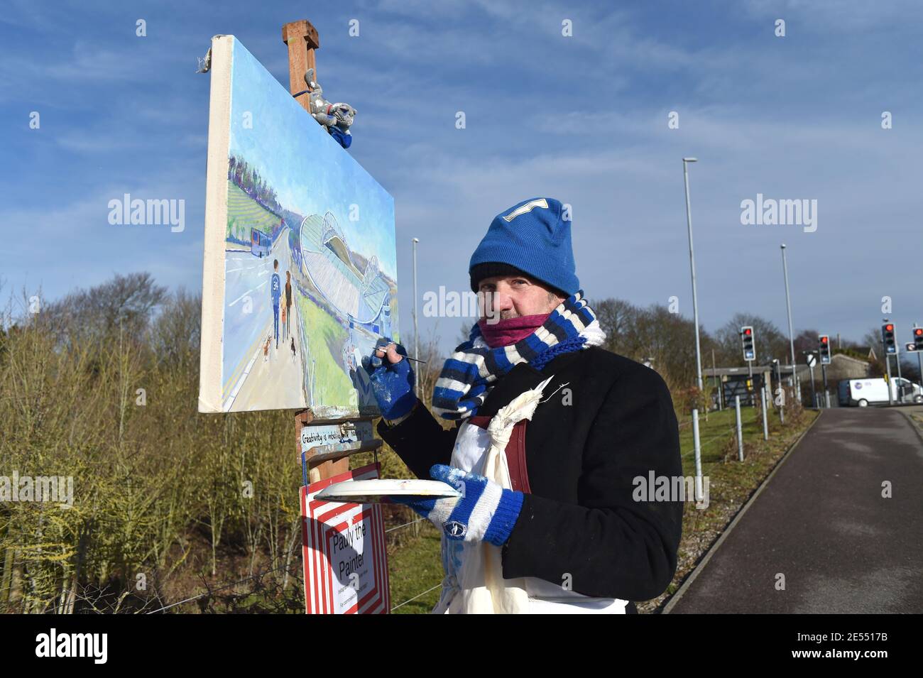 Local Sussex artist known as 'Pauly the Painter' painting the Amex Stadium from the approach road before  the Emirates FA Cup Fourth Round  match between Brighton and Hove Albion and Blackpool Town at the American Express Stadium  , Brighton , UK - 23rd January 2021 Stock Photo