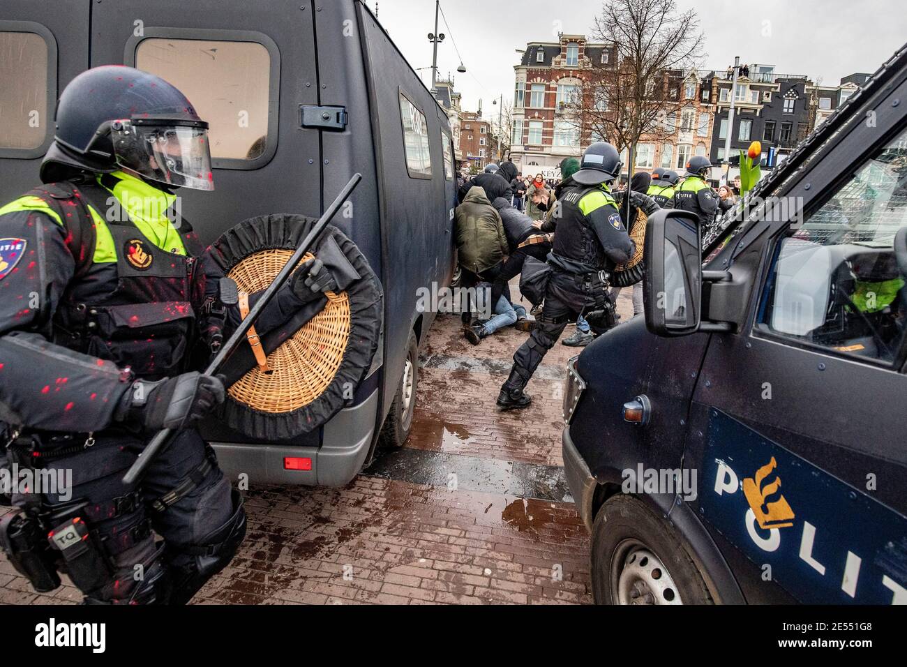 AMSTERDAM, NETHERLANDS, JANUARY 24: Riot police are seen clashing with protesters near the Museumplein on January 24, 2021 in Amsterdam, Netherlands. Stock Photo