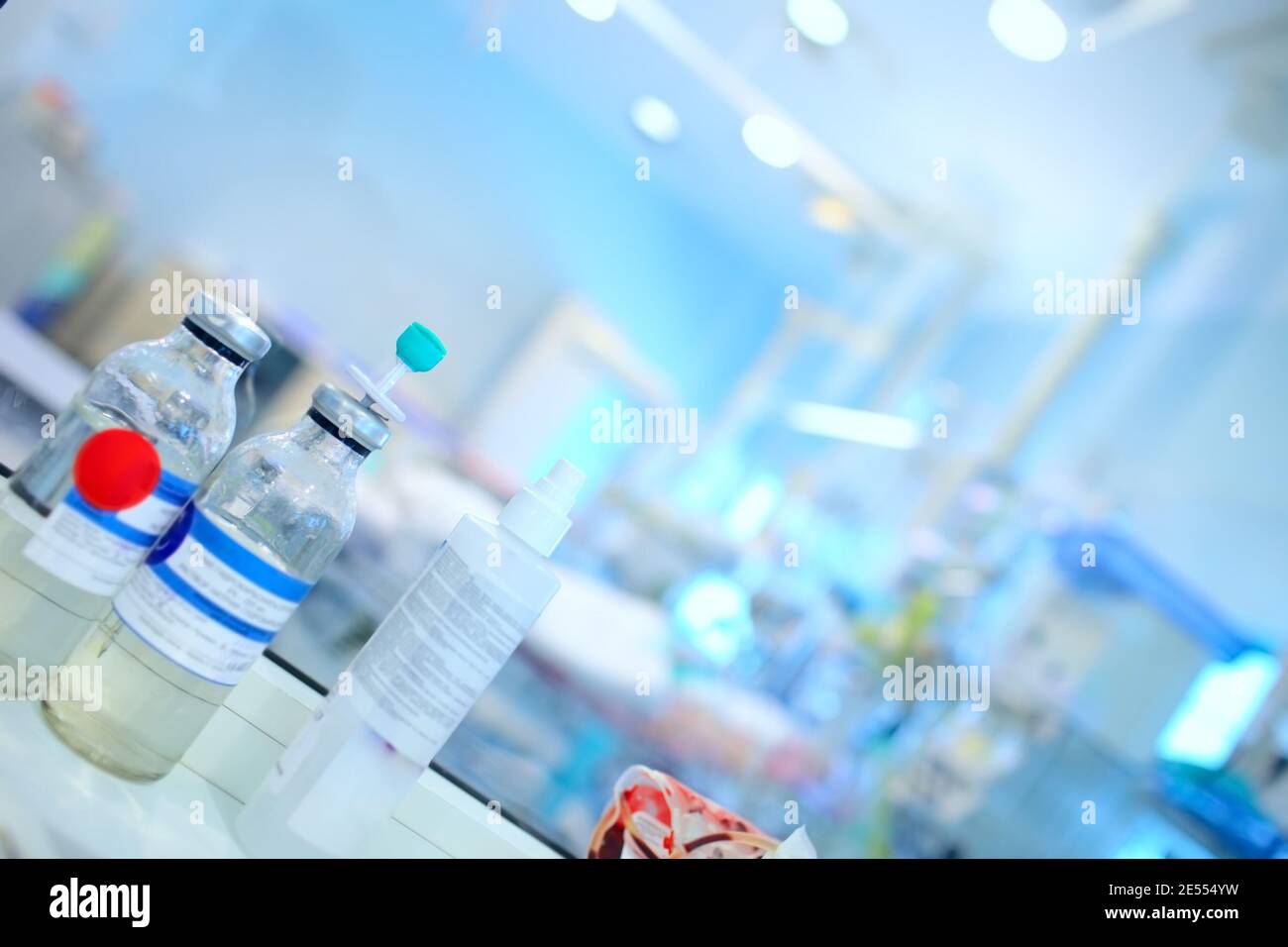 Drip bottles on the nurse's office in the ICU. Stock Photo