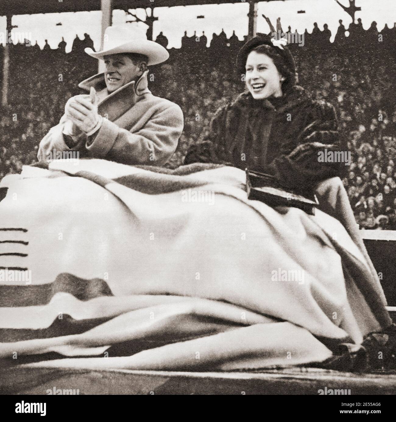 EDITORIAL ONLY Princess Elizabeth and the Duke of Edinburgh, seen here during their tour of Canada in 1951. Princess Elizabeth of York,1926 - 2022, future Elizabeth II, Queen of the United Kingdom.  Prince Philip, Duke of Edinburgh, born Prince Philip of Greece and Denmark,1921- 2021. Husband of Queen Elizabeth II of the United Kingdom. From The Queen Elizabeth Coronation Book, published 1953. Stock Photo