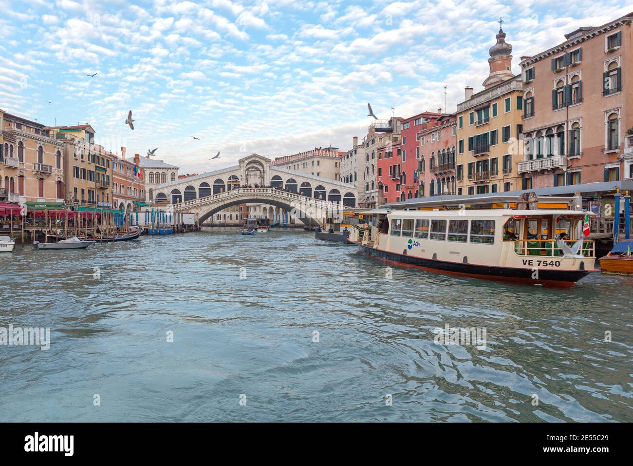 Venice, Italy - January 9, 2017: Public Transport Water Bus at Rialto Bridge Station Grand Canal in Venice, Italy. Stock Photo