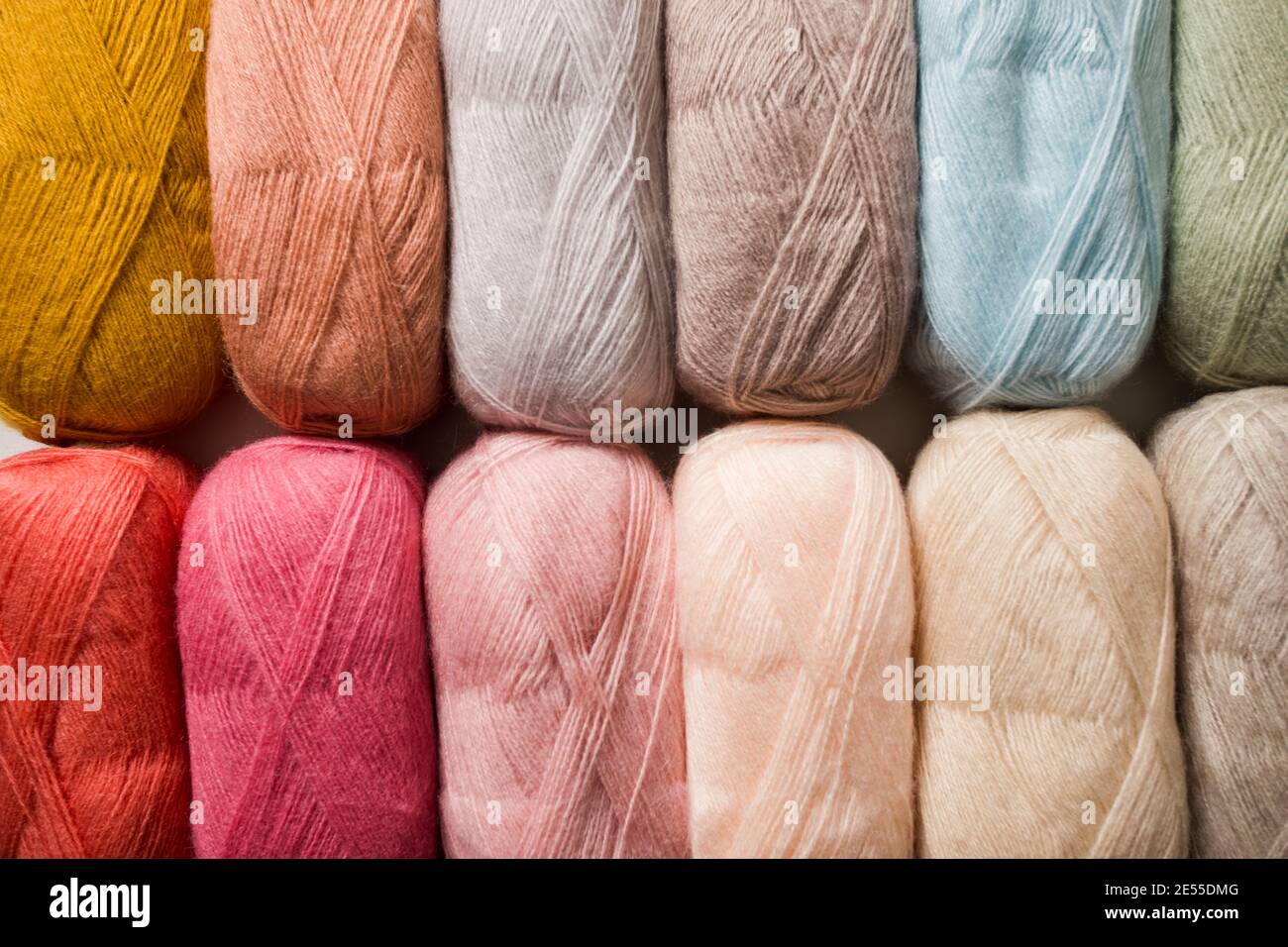 The multicolored fluffy threads for knitting warm clothes Stock Photo