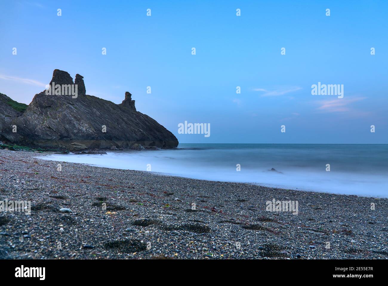 Stunning long exposure low ground view of seascape and Black Castle