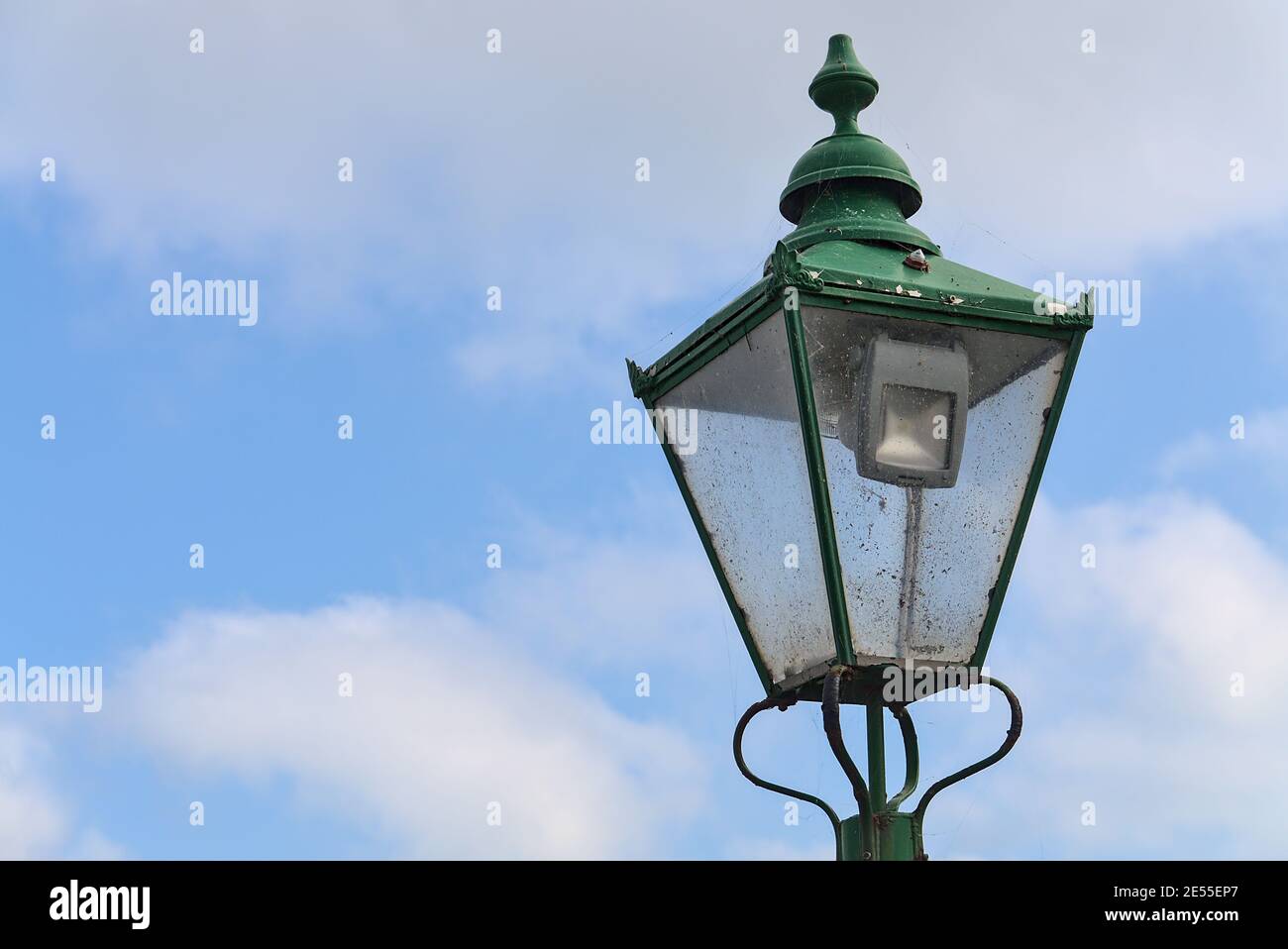 Beautiful antique luminous green street lantern at former Newcastle Railway Station, Sea Road, Leamore Upper, Arklow, Co. Wicklow, Ireland Stock Photo