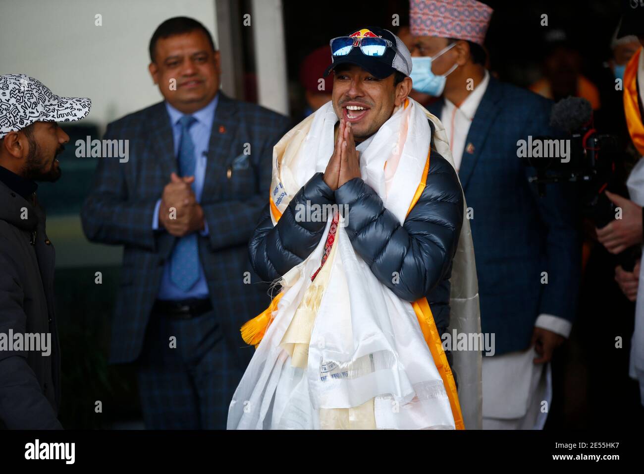 Kathmandu, Nepal. 26th Jan, 2021. Nepalese climber Nirmal Purja, who along with his team recently made history by scaling the K2 summit in the winter season, gestures upon his arrival to Tribhuvan International Airport in Kathmandu, Nepal on Tuesday, January 26, 2021. Credit: Skanda Gautam/ZUMA Wire/Alamy Live News Stock Photo