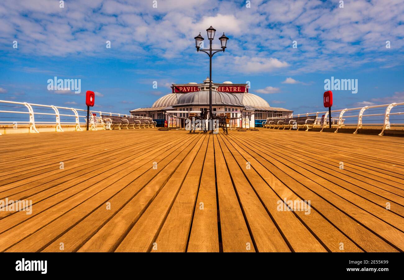View along Cromer pier to the Pavilion theatre Stock Photo Alamy