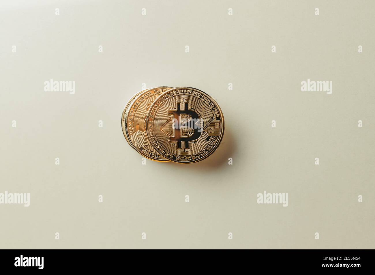 Bitcoin on a yellow background. Stock Photo