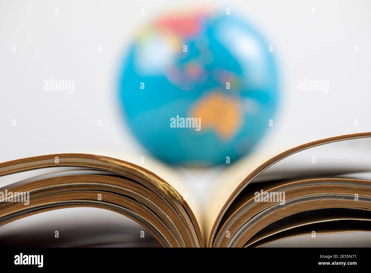 Opened book and world,  Education concept Stock Photo