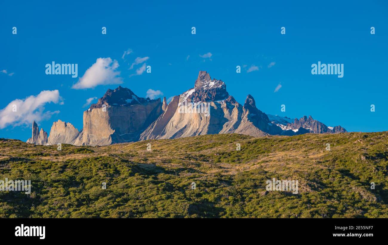 Major peaks, standing high towers teeth, surrounded by wet austral forests and Patagonian steppe, pampas in Torres del Paine National Park, Patagonia, Stock Photo