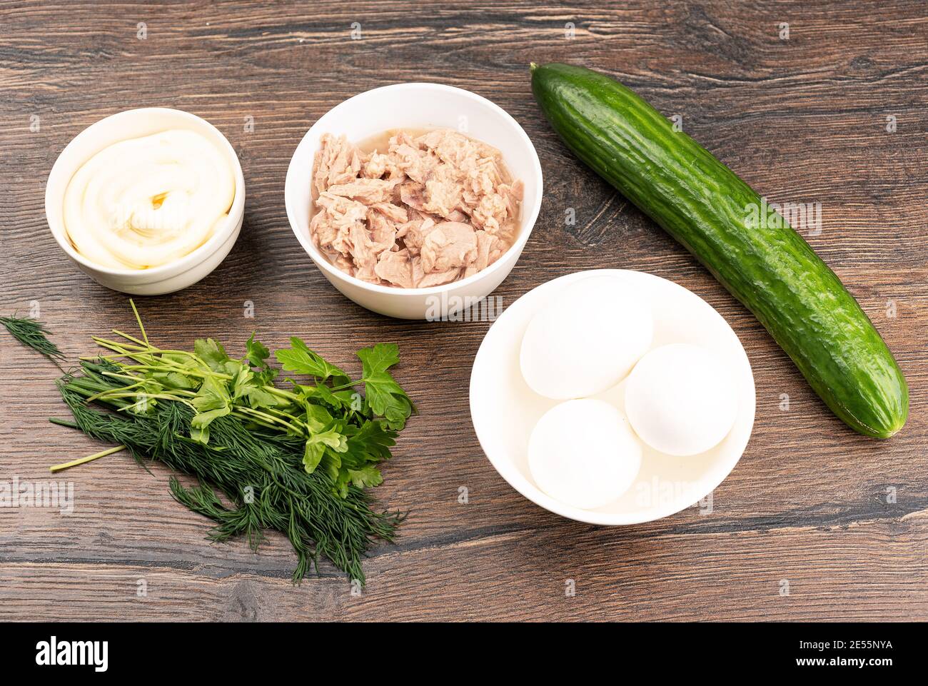 Ingredients for the tuna salad canned tuna, eggs, cucumber, mayonnaise