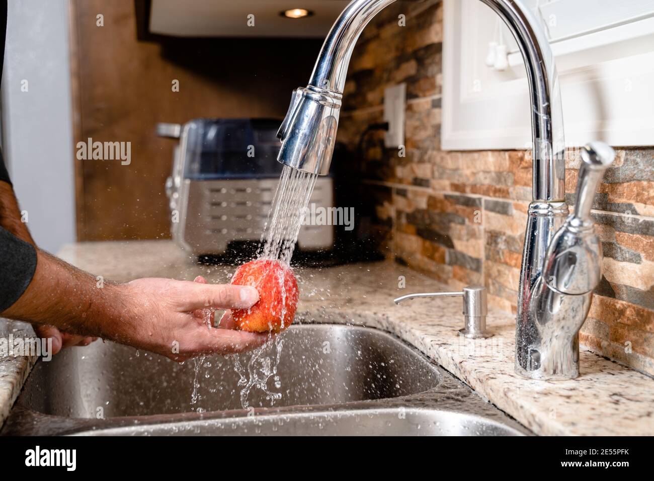 Washing fruit hi-res stock photography and images - Alamy