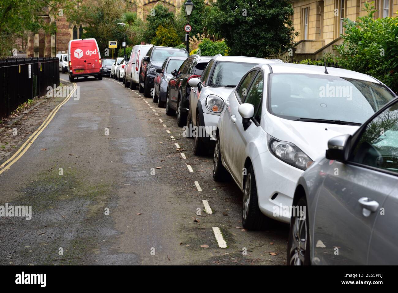 City residential street with cars parked, UK Stock Photo