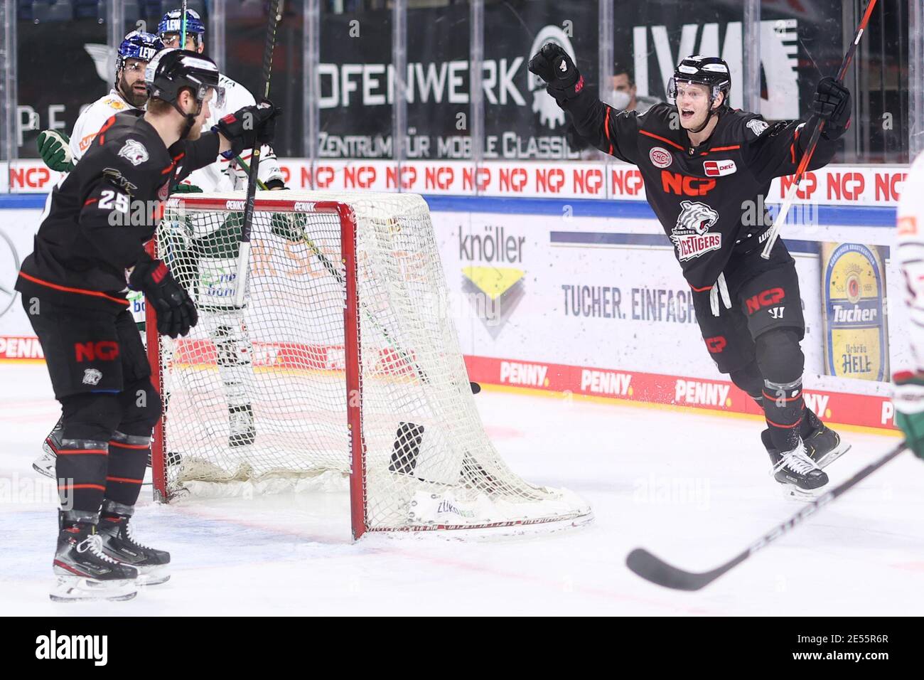 Nuremberg, Germany. 26th Jan, 2021. Ice hockey: DEL, Nürnberg Ice Tigers -  Augsburg Panthers, Main Round, Matchday 12, at the Nürnberger Versicherung  Arena. Nuremberg's Brett Pollock (r) celebrates with his colleague Daniel