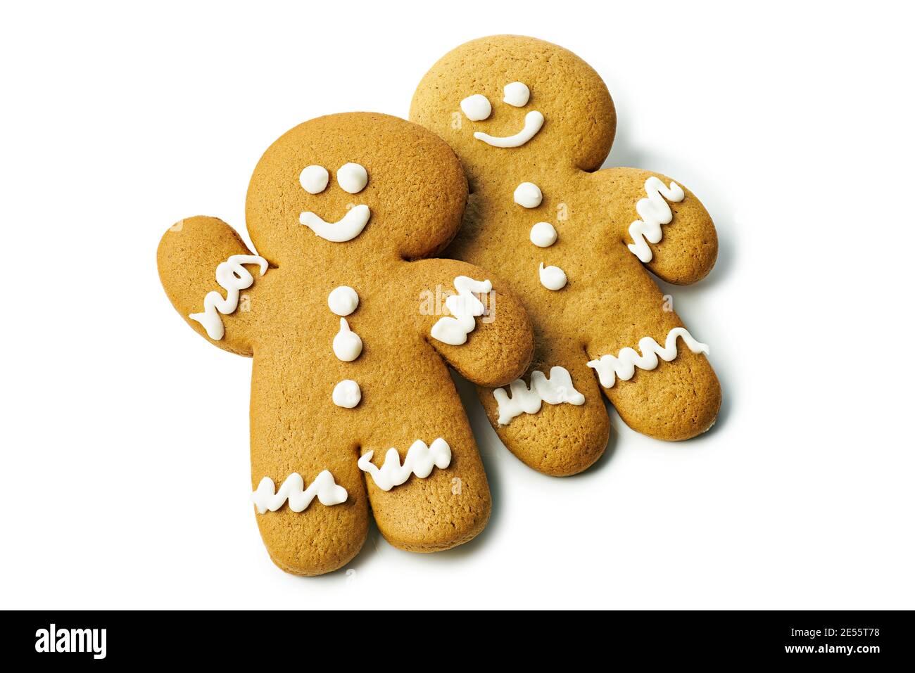 Two gingerbread cookies of man shape on white Stock Photo