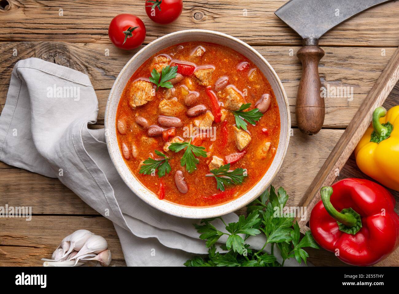Spicy red kidney bean stew with pork, tomato and bell peppers Stock