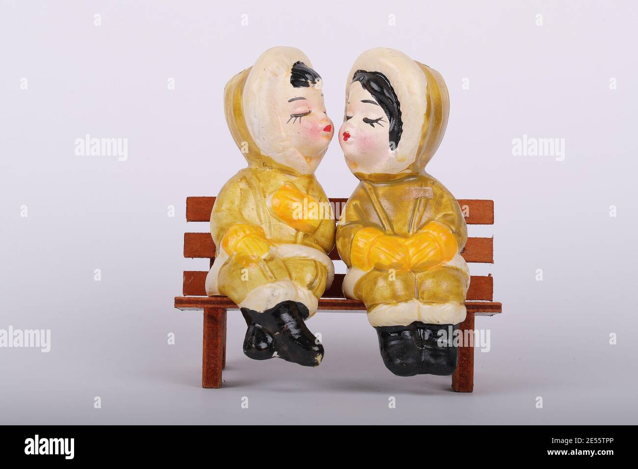 Vintage girls sitting on a bench Salt and Pepper Shakers from the 70's - 80's. Luke Durda/Alamy Stock Photo