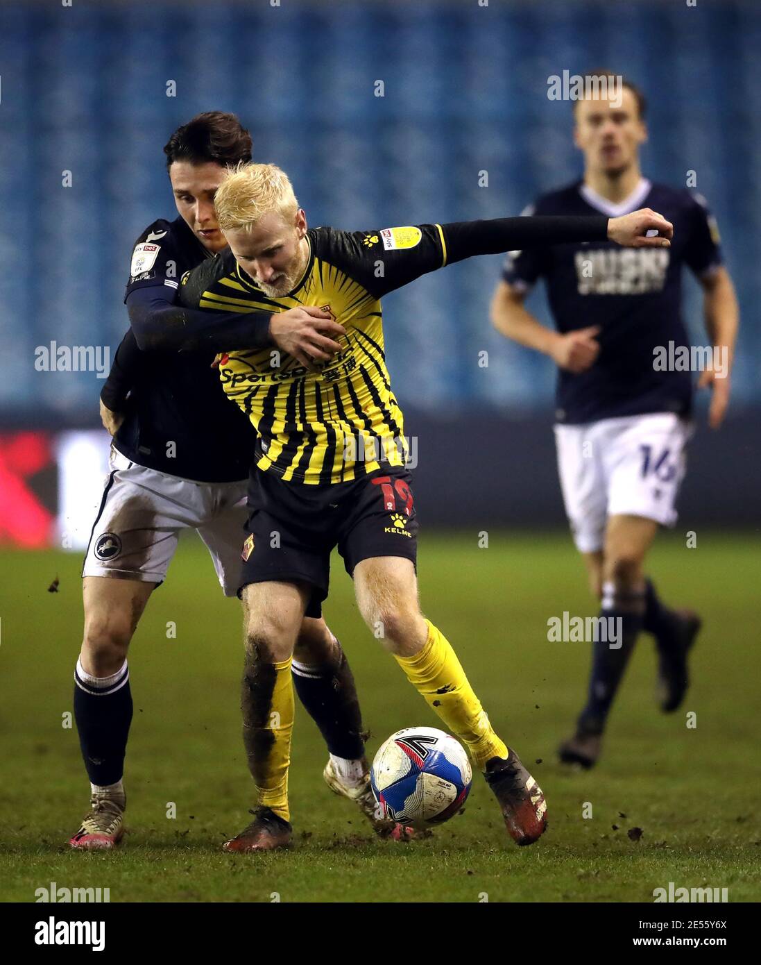 Millwall's Danny McNamara pulls back on Watford's Will Hughes during ...