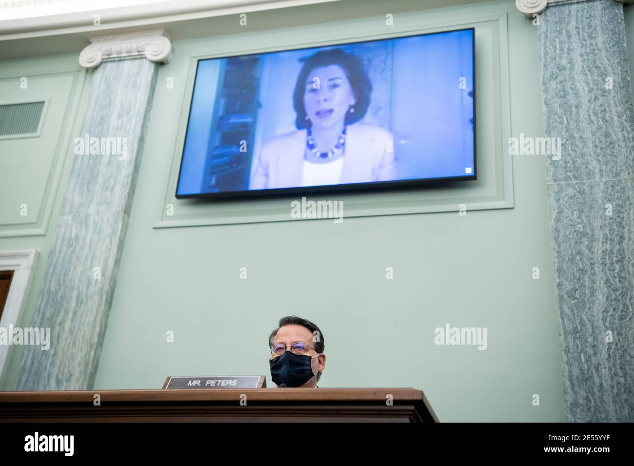 Washington, USA. 26th Jan, 2021. UNITED STATES - JANUARY 26 : Sen. Gary Peters, D-Mich., questions Gina Raimondo, nominee for Secretary of Commerce, during her Senate Commerce, Science, and Transportation Committee confirmation hearing in Russell Senate Office Building in Washington, DC, on Tuesday, January 26, 2021. (Photo By Tom Williams/Pool/Sipa USA) Credit: Sipa USA/Alamy Live News Stock Photo