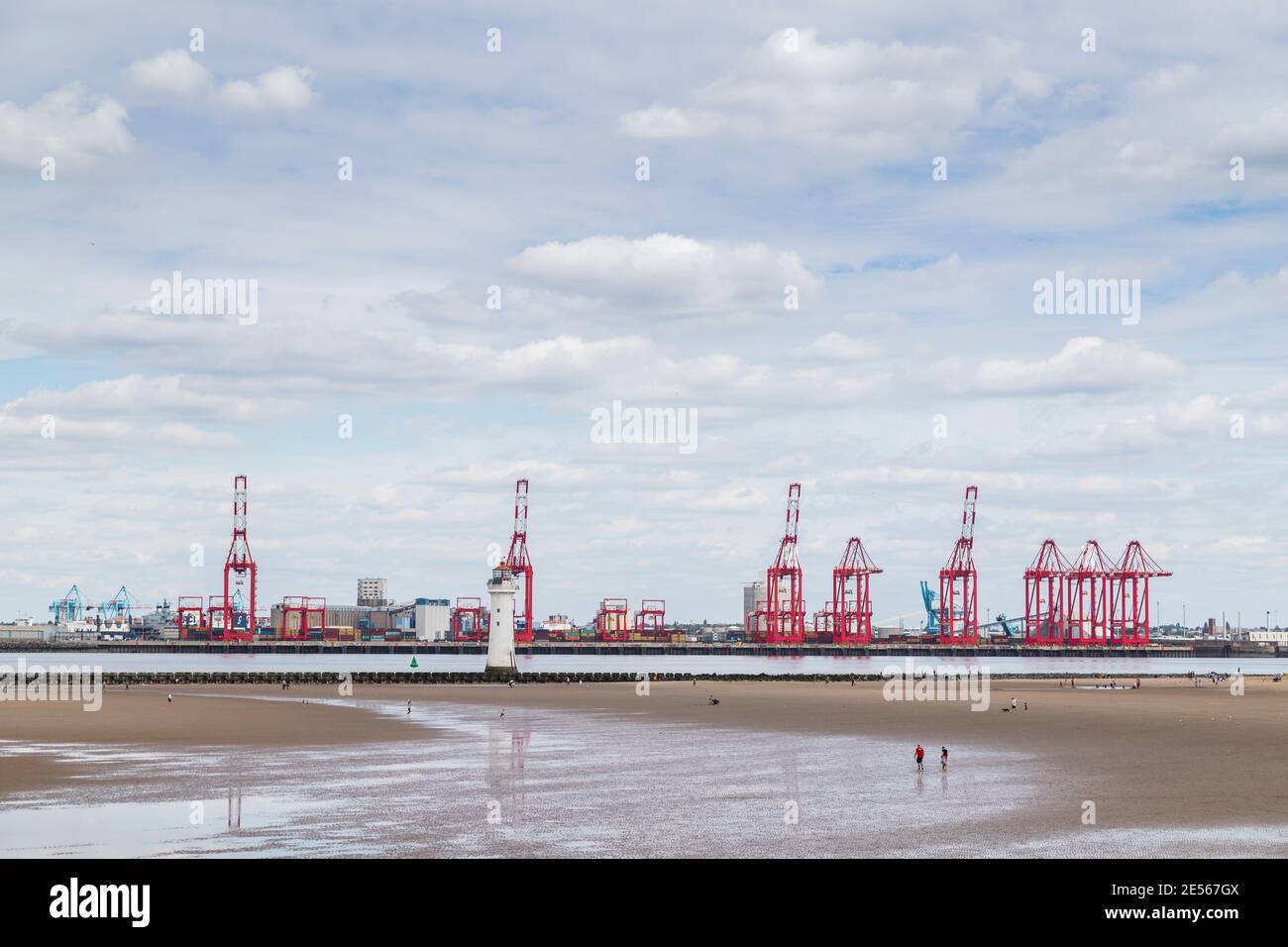 Wallasey beach in front of the Liverpool docks. Stock Photo