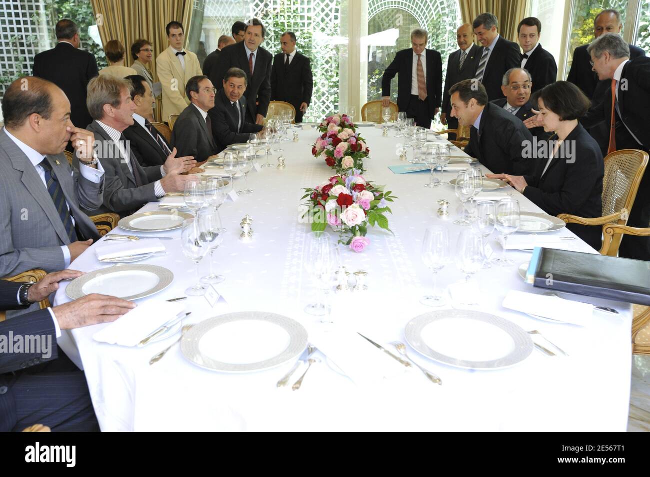 French President Nicolas Sarkozy and his Egyptian counterpart Muhammad Hosni Mubarak lunch flanked by Bernard Kouchner, Claude Gueant, Henri Guaino and Jean-David Levitte at Le Bristol in Paris, France on July 12, 2008. Photo by Elodie Gregoire/ABACAPRESS.COM Stock Photo