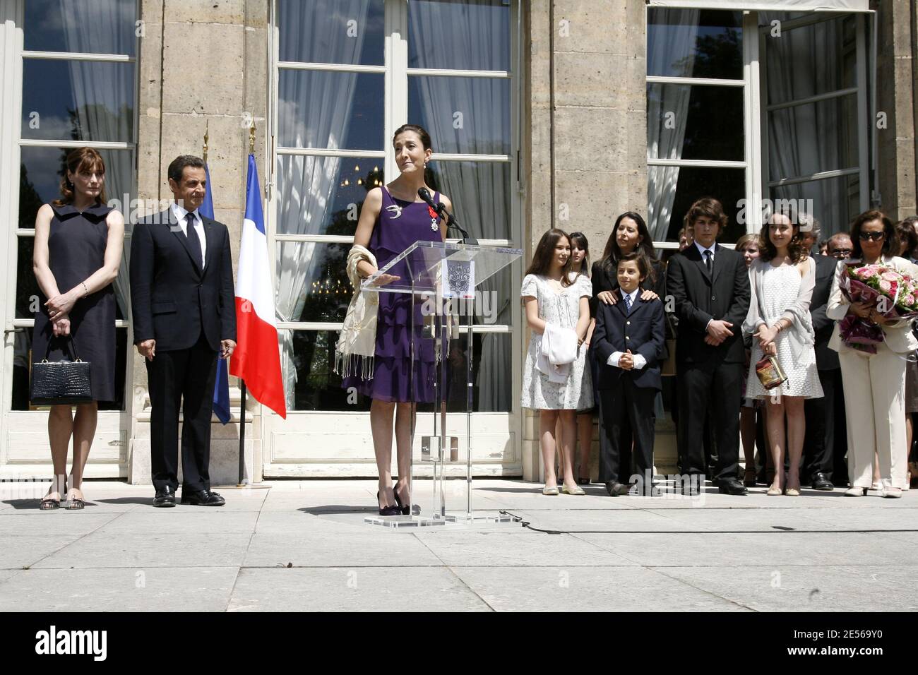 Former Franco-Colombian hostage Ingrid Betancourt reacts near French First Lady Carla Bruni-Sarkozy and President Nicolas Sarkozy and her family ( her niece Anastasia, her nephew Stanislas, her sister Astrid Betancourt, her son Lorenzo Delloye, her daughter Melanie Delloye and her mother Yolanda Pulecio after being awarded with the Legion of Honor by French President Nicolas Sarkozy during the July 14th traditional Garden Party at the Elysee Palace in Paris, France on July 14, 2008. Photo by Benainous-Hounsfield/Pool/ABACAPRESS.COM Stock Photo