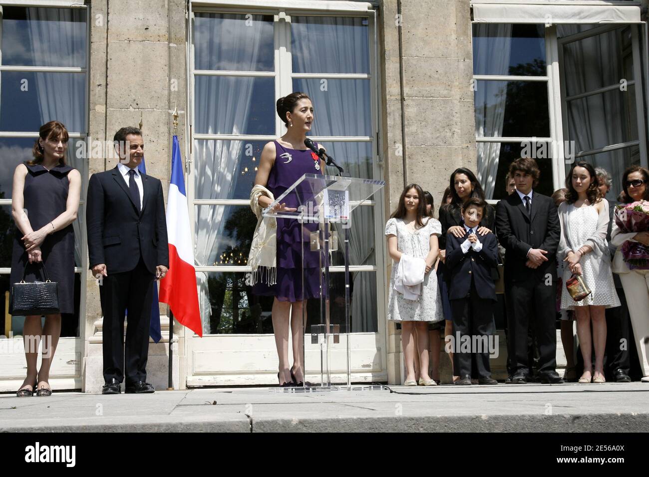 Former Franco-Colombian hostage Ingrid Betancourt reacts near French First Lady Carla Bruni-Sarkozy and President Nicolas Sarkozy and her family ( her niece Anastasia, her nephew Stanislas, her sister Astrid Betancourt, her son Lorenzo Delloye, her daughter Melanie Delloye and her mother Yolanda Pulecio after being awarded with the Legion of Honor by French President Nicolas Sarkozy during the July 14th traditional Garden Party at the Elysee Palace in Paris, France on July 14, 2008. Photo by Benainous-Hounsfield/Pool/ABACAPRESS.COM Stock Photo