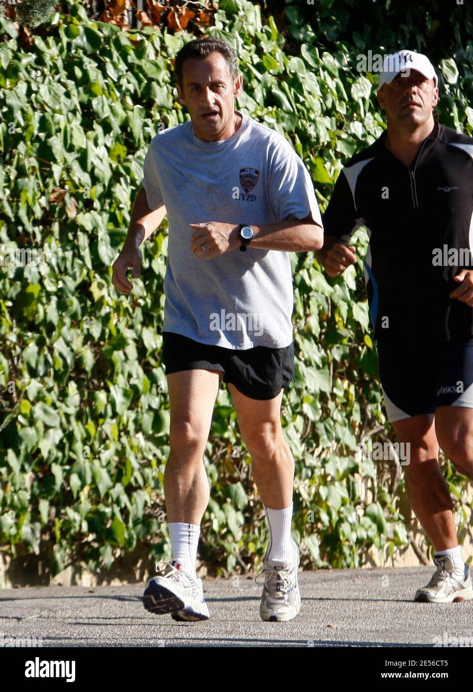 Nicolas Sarkozy is seen jogging with his bodyguards near Bruni-Tedeschi's  family house in 'Cap Negre,'