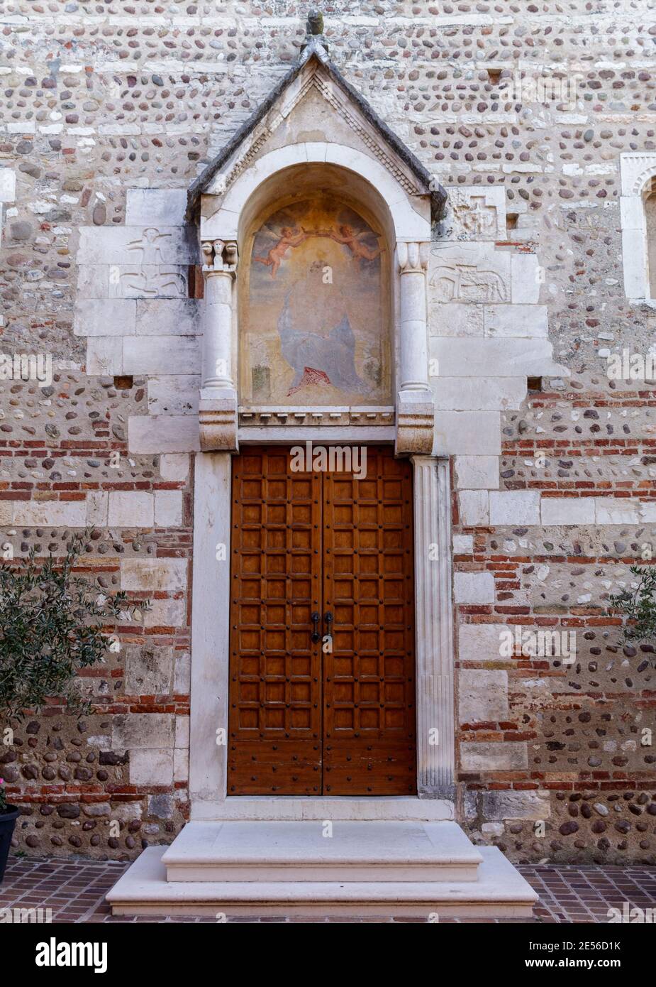 The door of the church of Cisano in the province of Verona. Stock Photo