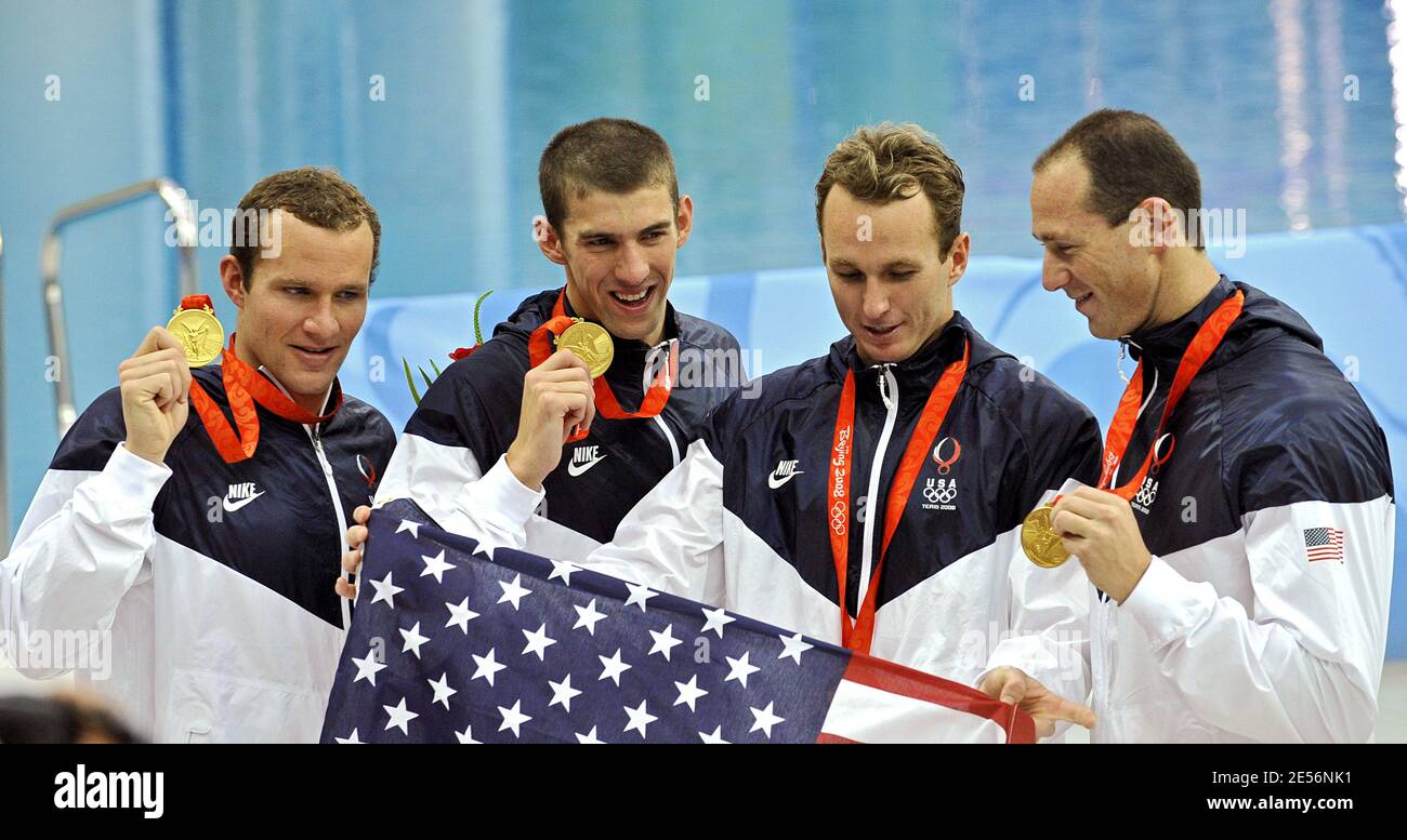L-R) Michael Phelps, Brendan Hansen, Jason Lezak and Aaron Piersol of the  United States after receiving their gold medals in the Men's 4x100 Medley  Relay at the XXIX Beijing Olympic Games Day