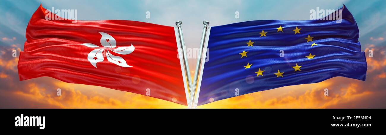 European Union Flag and Hong Kong flag waving with texture sky Cloud and sunset Double flag Stock Photo