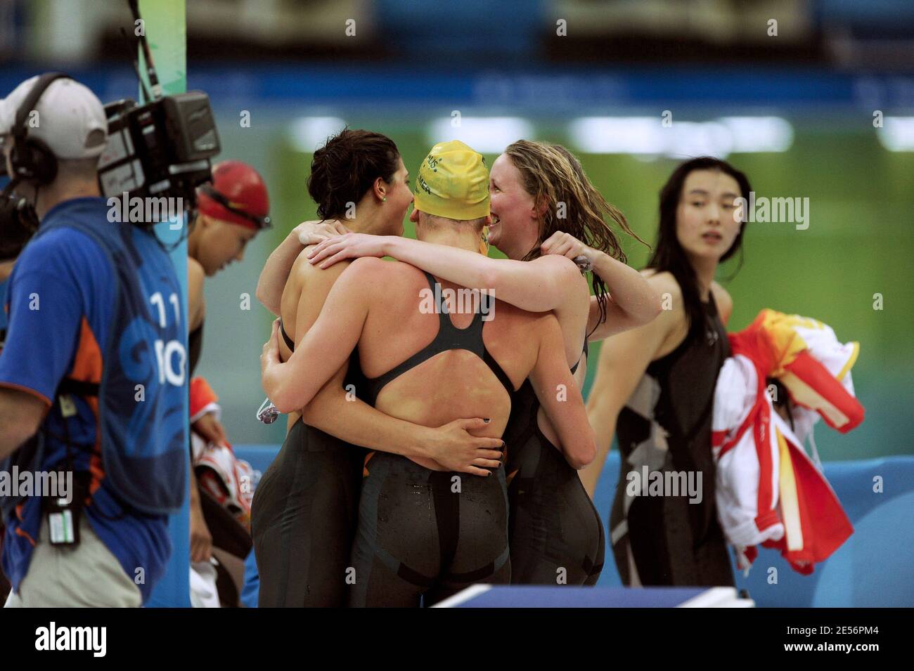 Stephanie Rice, Bronte Barratt and Kylie Palmer of Australia celebrate winning the Women's 4 x 200m Freestyle Relay Final and the gold medal held at the National Aquatics Centre during Day 6 of the Beijing 2008 Olympic Games on August 14, 2008 in Beijing, China. The Australian Team finished the race in a time of 7:44.31, a new World ReCOMrd. Photo by Gouhier-Hahn-Nebinger/Cameleon/ABACAPRESS.CO Stock Photo