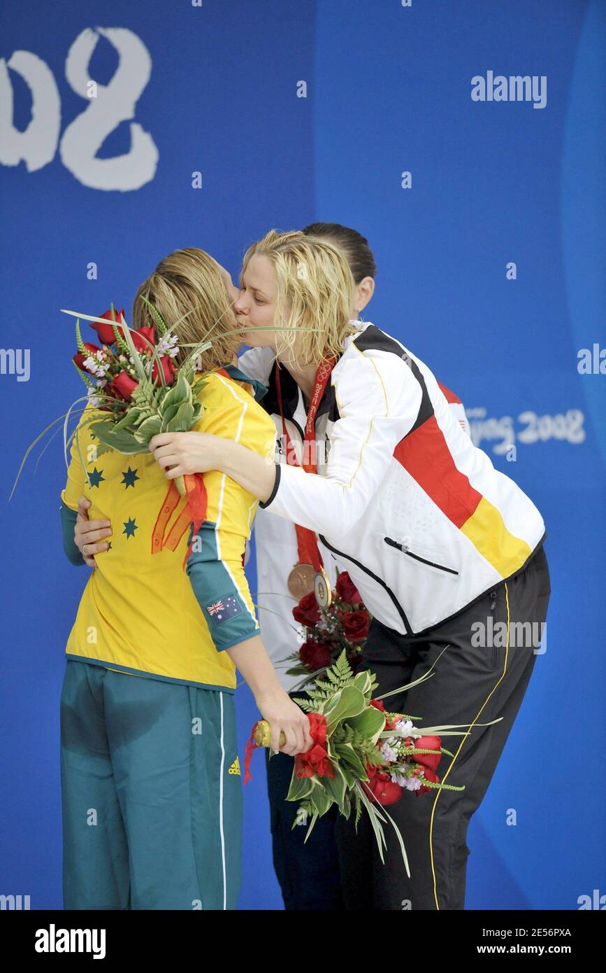 Germany's Britta Steffen (L) is congratulated by Australia's Libby Trickett (R) after the women's 100m freestyle swimming Tinal during the Beijing Olympic Games at the National Aquatics Center in Beijing, China on August 15, 2008. Germany's Britta Steffen claimed the gold medal in an Olympic record 53.12 seconds, just four-hundredths of a second ahead of world champion Libby Trickett of Australia. US swimmer Natalie Coughlin took the bronze and equalled the US record in 53.39. Photo by Gouhier-Hahn-Nebinger/Cameleon/ABACAPRESS.COM Stock Photo