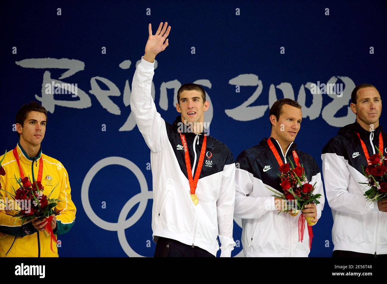 USA swimmers Michael Phelps (2nd L), Brendan Hansen (3rd L), Jason Lezak  (2nd R) and Australia's Eamon Sullivan (L) stand on the podium for the  men's 4 x 100m medley relay swimming